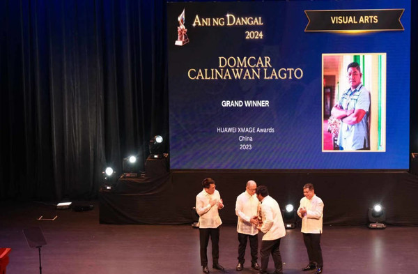 李小龍:華為影像大賽獲獎?wù)叩梅坡少e總統表彰